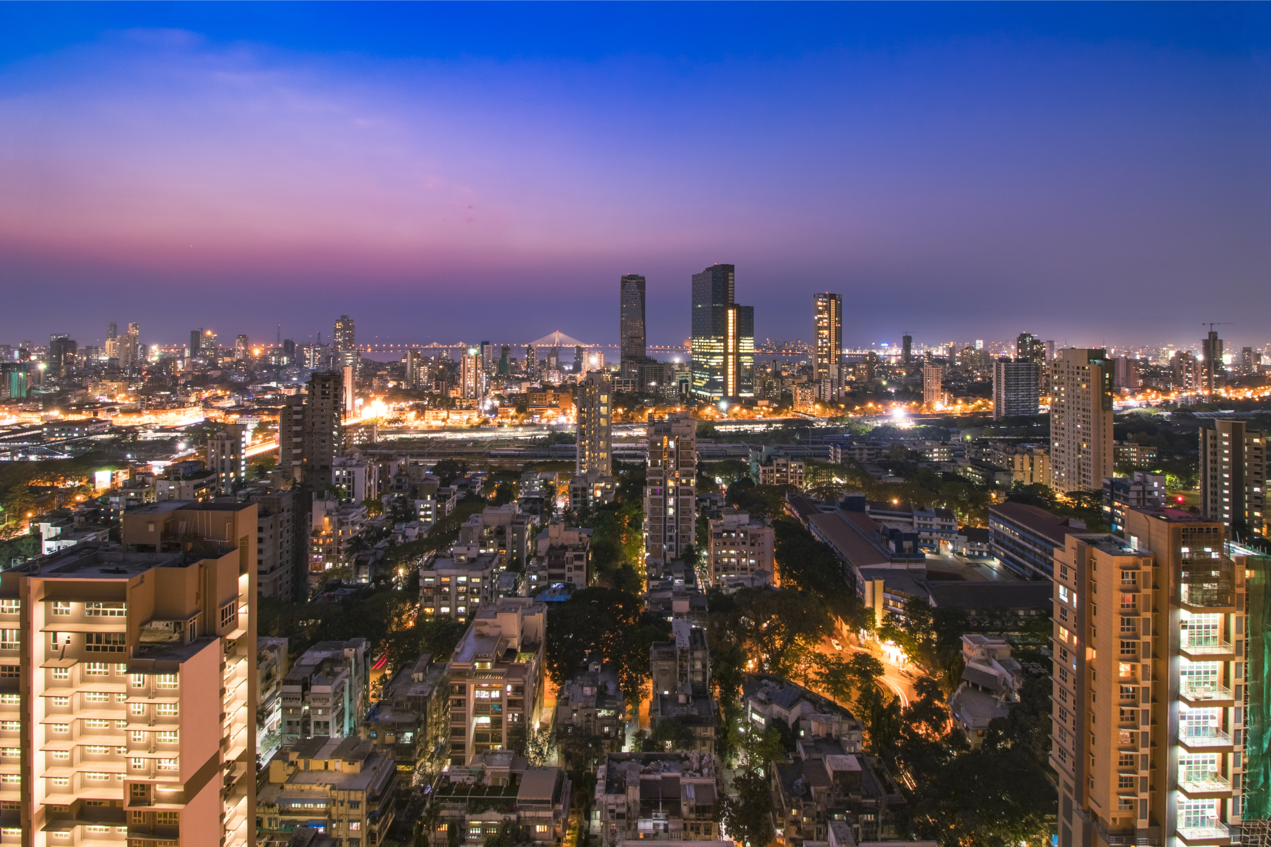 Dharavi Mumbai redevelopment 2026 central location aerial view